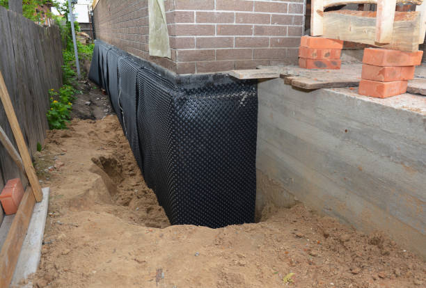 SJ Waterproofing Pros technician performing targeted Waterproofing assessment in Church Hill, MD